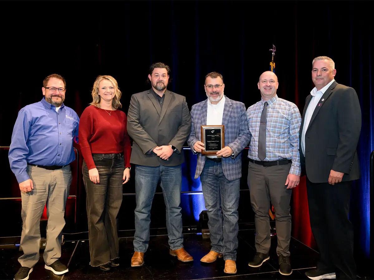 The Empire Fence team accepts the prestigious Ornamental Commercial   Project Award from the American Fence Association for their work on the   behavioral health courtyard and wellness center at Children's Hospital &   Medical Center.