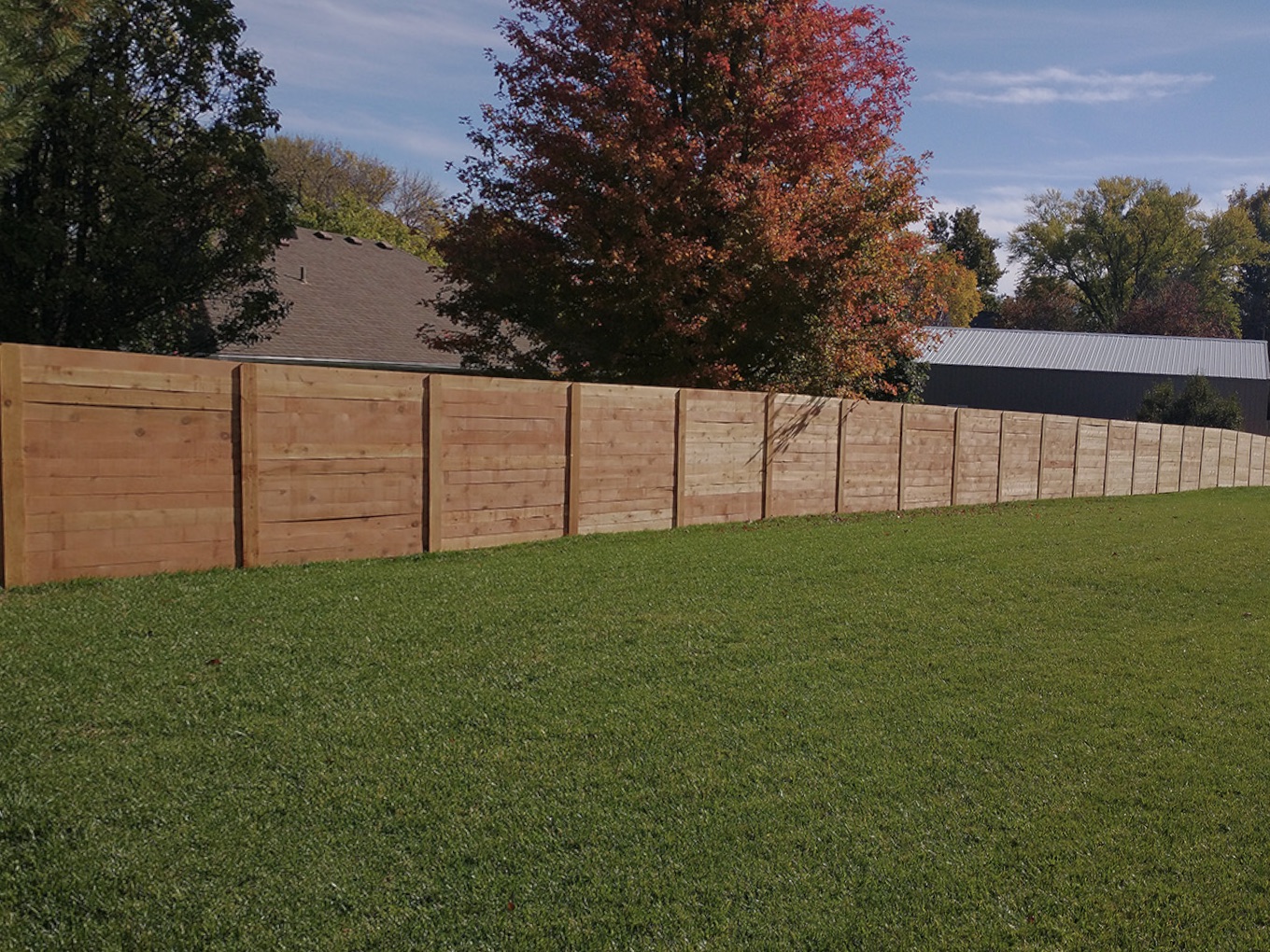 Photo of a Nebraska wood fence using Postmaster posts